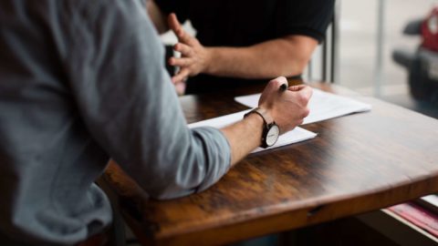 Two People At A Meeting